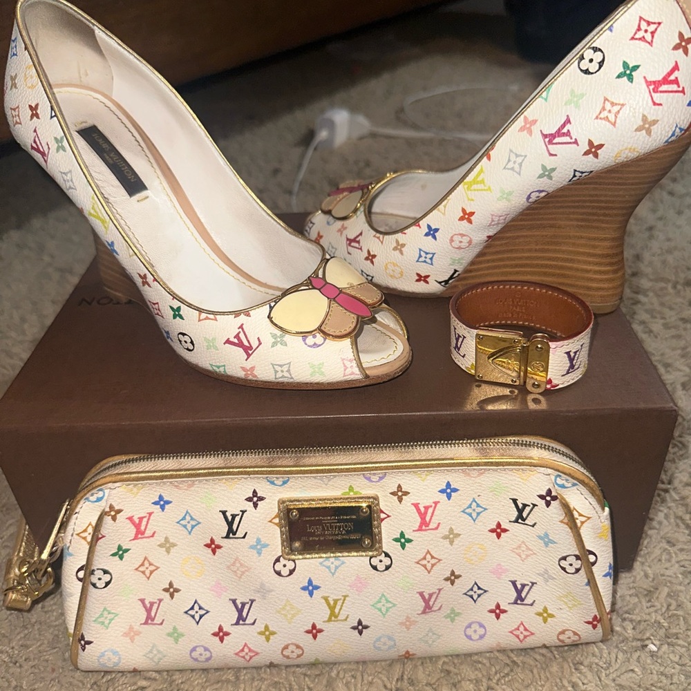 Louis Vuitton bracelet shoes and a wristlet.